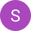 White letter S on a solid purple circle with black background