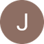 White letter J inside a brown circular icon