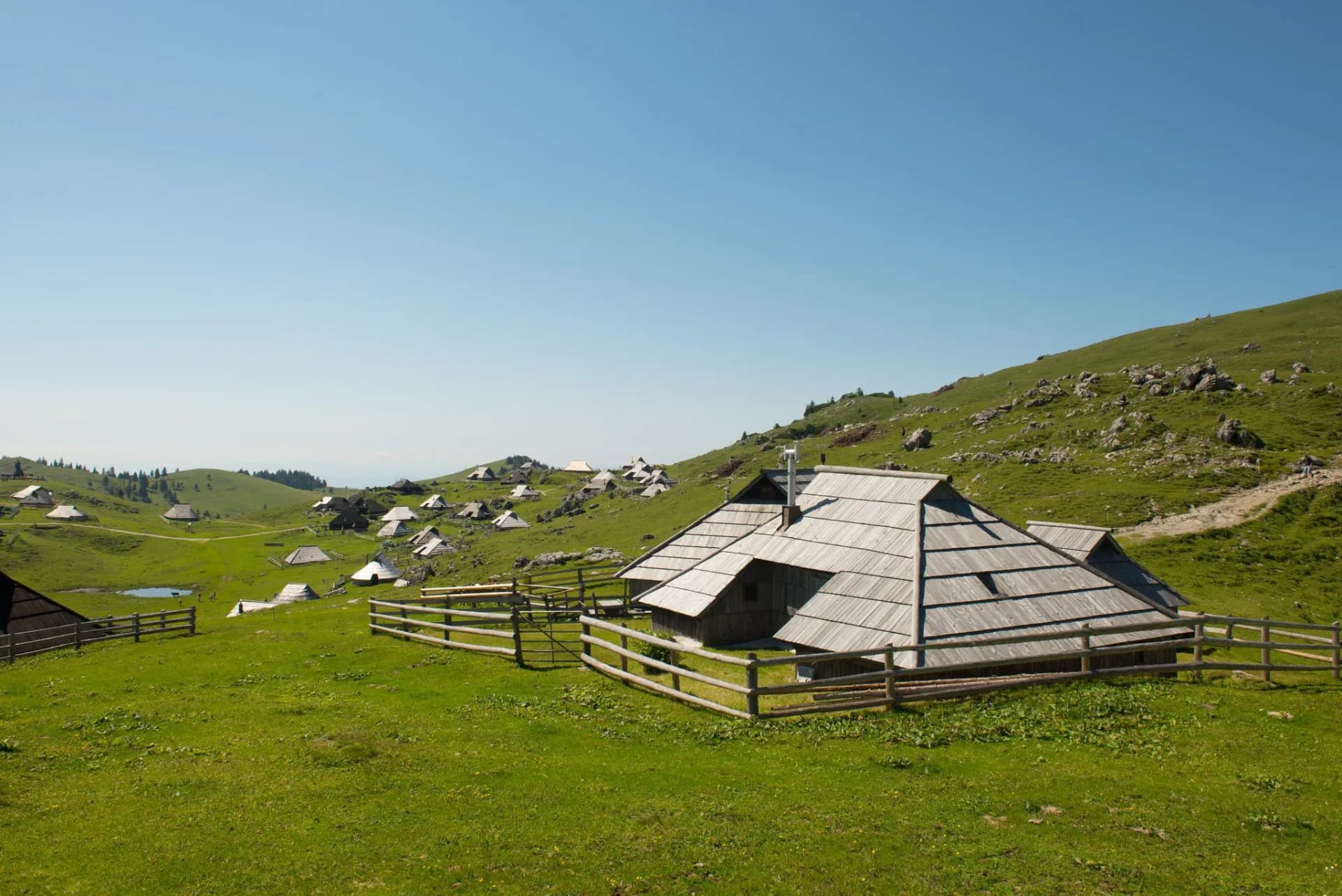 Huts Velika Planina scaled 1