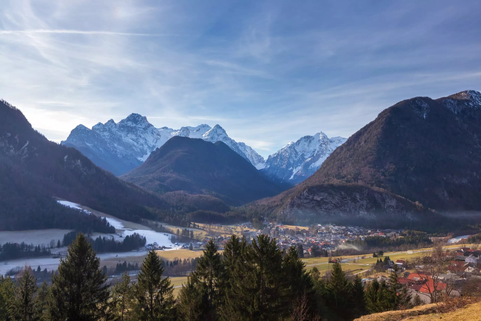 Village Mojstrana Slovenia mountains alps snow spring fog valley